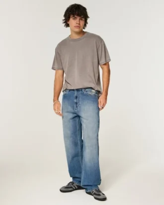 Baggy-Jeans mit Alien-Grafik in mittlerer Waschung