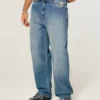 Baggy-Jeans mit Alien-Grafik in mittlerer Waschung Baggy-Jeans mit Alien-Grafik in mittlerer Waschung