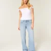 Baggy-Jeans mit niedriger Leibhöhe, heller Waschung und Nietenverzierungen Baggy-Jeans mit niedriger Leibhöhe, heller Waschung und Nietenverzierungen