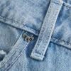 Baggy-Jeans mit niedriger Leibhöhe, heller Waschung und Nietenverzierungen Baggy-Jeans mit niedriger Leibhöhe, heller Waschung und Nietenverzierungen