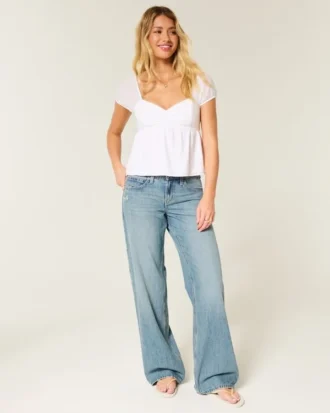 Baggy-Jeans mit niedriger Leibhöhe, mittlerer Waschung und Schmetterlingsmotiv