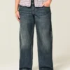 Baggy-Jeans mit niedriger Leibhöhe und dunkler Waschung im Y2K-Stil Baggy-Jeans mit niedriger Leibhöhe und dunkler Waschung im Y2K-Stil