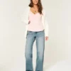 Baggy-Jeans mit niedriger Leibhöhe und mittlerer Waschung Baggy-Jeans mit niedriger Leibhöhe und mittlerer Waschung