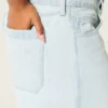 Baggy-Jort mit niedriger Leibhöhe, heller Waschung und Schleifenverzierung Baggy-Jort mit niedriger Leibhöhe, heller Waschung und Schleifenverzierung