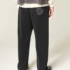 Baggy-Sweathose mit Spinnenstickerei