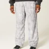 Baggy-Trainingshose in Camouflage-Optik Baggy-Trainingshose in Camouflage-Optik