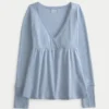 Bequemes Langarm-Babydoll-Oberteil mit Pointelle-Strick Bequemes Langarm-Babydoll-Oberteil mit Pointelle-Strick