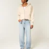 Bestickte, hellblaue Skater-Baggy-Jeans Bestickte, hellblaue Skater-Baggy-Jeans