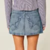 Bestickte Jeans-Minirockhose mit Sternentasche