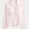 Bluse mit Spitzenbesatz und Knopfleiste