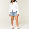 Bluse mit Spitzenbesatz und Knopfleiste