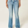 Bootcut-Jeans mit niedriger Leibhöhe, mittlerer Waschung und floraler Stickerei Bootcut-Jeans mit niedriger Leibhöhe, mittlerer Waschung und floraler Stickerei