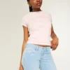 Bootcut-Jeans mit niedriger Leibhöhe und Sternstickerei Bootcut-Jeans mit niedriger Leibhöhe und Sternstickerei