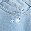 Bootcut-Jeans mit niedriger Leibhöhe und Sternstickerei Bootcut-Jeans mit niedriger Leibhöhe und Sternstickerei