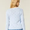 Cardigan mit Ösen und Rundhalsausschnitt Cardigan mit Ösen und Rundhalsausschnitt