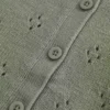 Cardigan mit Ösen und Rundhalsausschnitt Cardigan mit Ösen und Rundhalsausschnitt