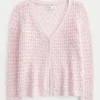 Dreiviertelärmelige Strickjacke im Häkelstil
