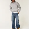 Dunkel gewaschene Jeans mit Logo-Stickerei Super Baggy Jeans Dunkel gewaschene Jeans mit Logo-Stickerei Super Baggy Jeans