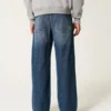 Dunkel gewaschene Jeans mit Logo-Stickerei Super Baggy Jeans Dunkel gewaschene Jeans mit Logo-Stickerei Super Baggy Jeans