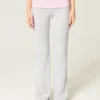 Faltbund-Strickhose mit ausgestelltem Bein Faltbund-Strickhose mit ausgestelltem Bein