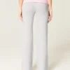 Faltbund-Strickhose mit ausgestelltem Bein Faltbund-Strickhose mit ausgestelltem Bein