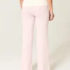 Faltbund-Strickhose mit ausgestelltem Bein Faltbund-Strickhose mit ausgestelltem Bein