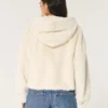 Gemütlicher Hoodie mit Kunstfell und Reißverschluss Gemütlicher Hoodie mit Kunstfell und Reißverschluss