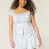 Gestaffelte Mini-Skort mit Smokarbeit