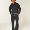 Gewaschene schwarze Baggy-Jeans im Painter-Stil Gewaschene schwarze Baggy-Jeans im Painter-Stil