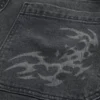 Gewaschene schwarze Baggy-Jeans mit Grafik Gewaschene schwarze Baggy-Jeans mit Grafik