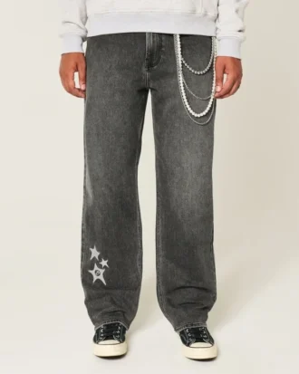Gewaschene schwarze Baggy-Jeans mit Stern-Grafik