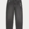 Gewaschene schwarze Skater-Baggy-Jeans mit Spielkarten-Joker-Grafik