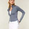 Gilly Hicks Active Recharge Jacke mit seitlichem Bindegürtel und Reißverschluss Gilly Hicks Active Recharge Jacke mit seitlichem Bindegürtel und Reißverschluss
