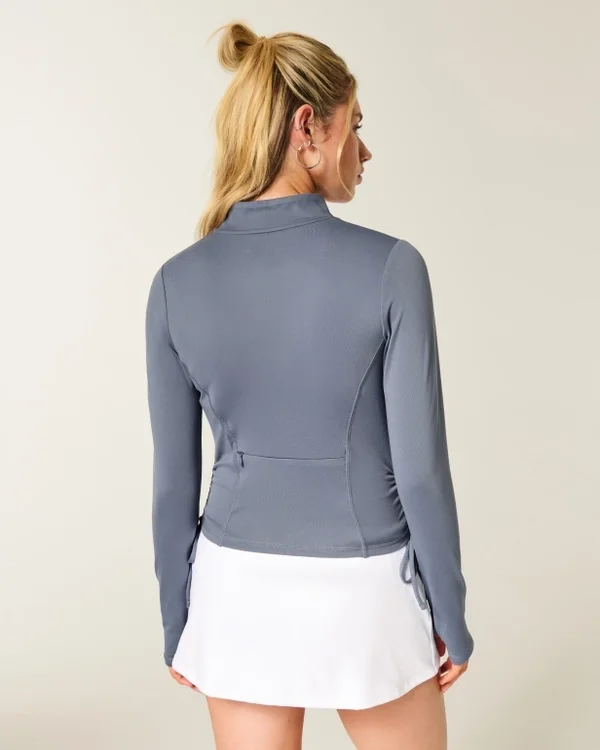 Gilly Hicks Active Recharge Jacke mit seitlichem Bindegürtel und Reißverschluss Gilly Hicks Active Recharge Jacke mit seitlichem Bindegürtel und Reißverschluss