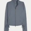 Gilly Hicks Active Recharge Jacke mit seitlichem Bindegürtel und Reißverschluss Gilly Hicks Active Recharge Jacke mit seitlichem Bindegürtel und Reißverschluss