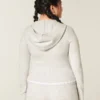 Gilly Hicks Sweatshirt mit Zip-Up-Kapuze und gewelltem Saum Gilly Hicks Sweatshirt mit Zip-Up-Kapuze und gewelltem Saum