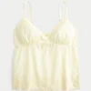 Glitzerndes Babydoll-Oberteil mit Stickerei Glitzerndes Babydoll-Oberteil mit Stickerei
