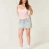 Hellblau gewaschene Mini-Skort aus Denim mit Schnürung Hellblau gewaschene Mini-Skort aus Denim mit Schnürung