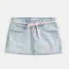 Hellblau gewaschene Mini-Skort aus Denim mit Schnürung Hellblau gewaschene Mini-Skort aus Denim mit Schnürung