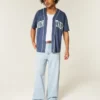 Hellblaue New York Graphic Super Baggy Jeans Hellblaue New York Graphic Super Baggy Jeans