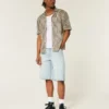 Hellblaue Super-Baggy-Jeansshorts mit Würfelgrafik Hellblaue Super-Baggy-Jeansshorts mit Würfelgrafik