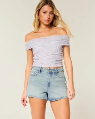 Hoch geschnittene A-Linien-Jeansshorts in heller Waschung mit Used-Look
