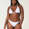 Hoch geschnittene, bestickte Bikinihose mit Trägern