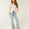 Hoch geschnittene Flare-Jeans in mittlerer Waschung