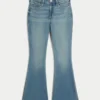 Hoch geschnittene Flare-Jeans in mittlerer Waschung Hoch geschnittene Flare-Jeans in mittlerer Waschung