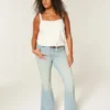 Hoch geschnittene, hellblaue Star Pocket Flare Jeans Hoch geschnittene, hellblaue Star Pocket Flare Jeans