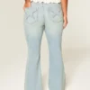Hoch geschnittene, hellblaue Star Pocket Flare Jeans Hoch geschnittene, hellblaue Star Pocket Flare Jeans