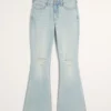 Hoch geschnittene, leicht verwaschene Flare-Jeans mit Rissen Hoch geschnittene, leicht verwaschene Flare-Jeans mit Rissen