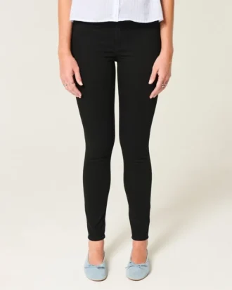 Hoch geschnittene schwarze Jeans-Leggings