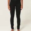 Hoch geschnittene schwarze Jeans-Leggings Hoch geschnittene schwarze Jeans-Leggings